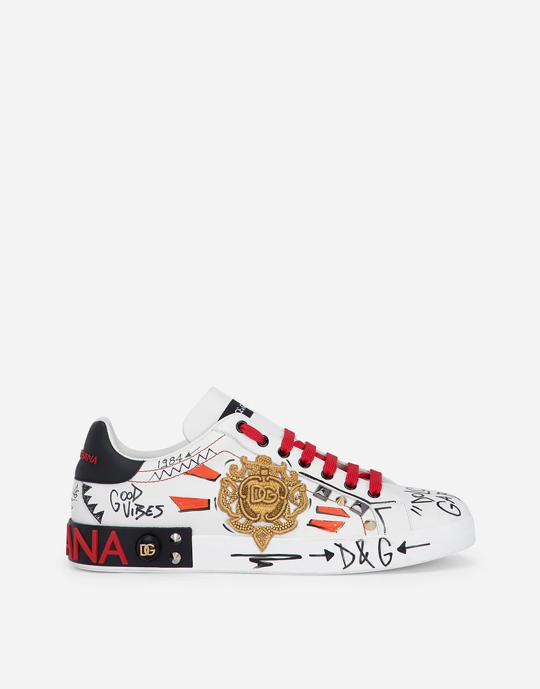 Calfskin Portofino sneakers with embroidery and studs