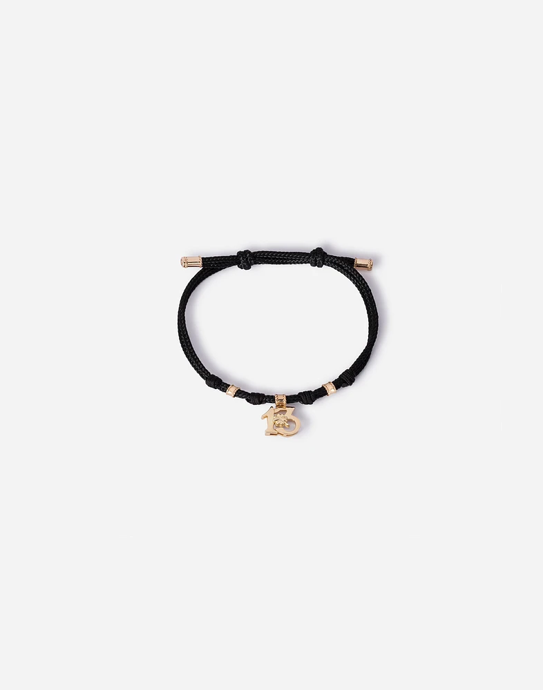 Good Luck Bracelet fabric with a pendant in 18 carat yellow gold