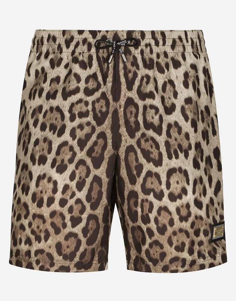 Mid-length swim trunks with leopard print