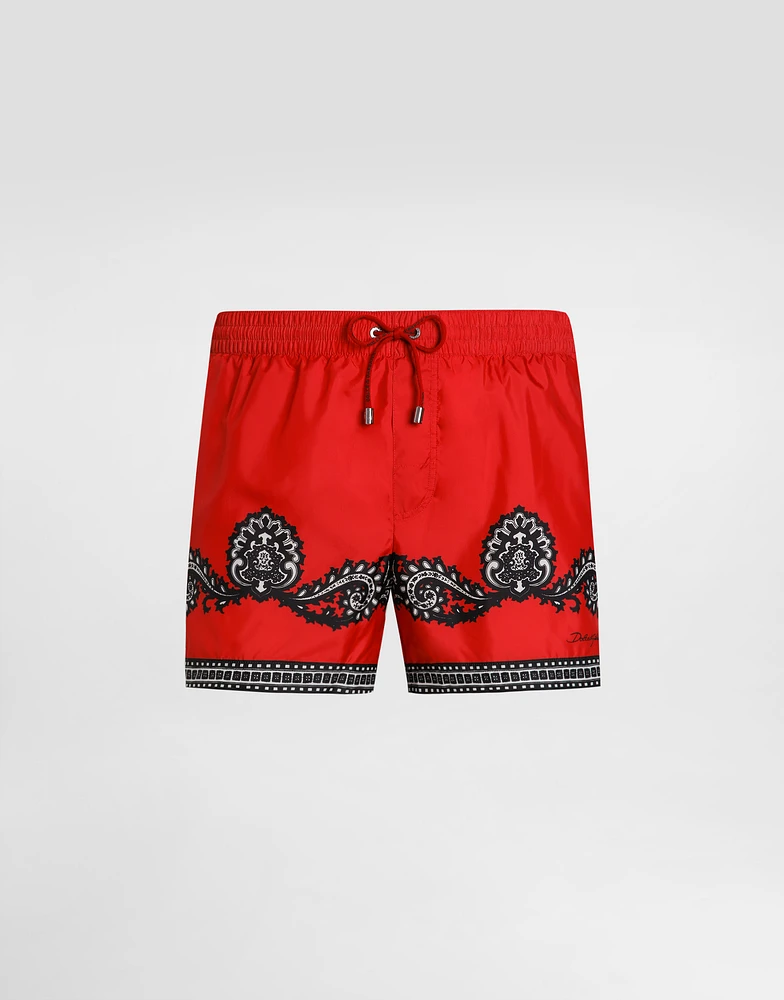 Short swim trunks with bandanna print