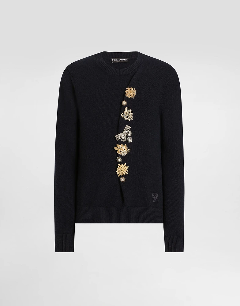 Wool round-neck sweater with bejeweled buttons
