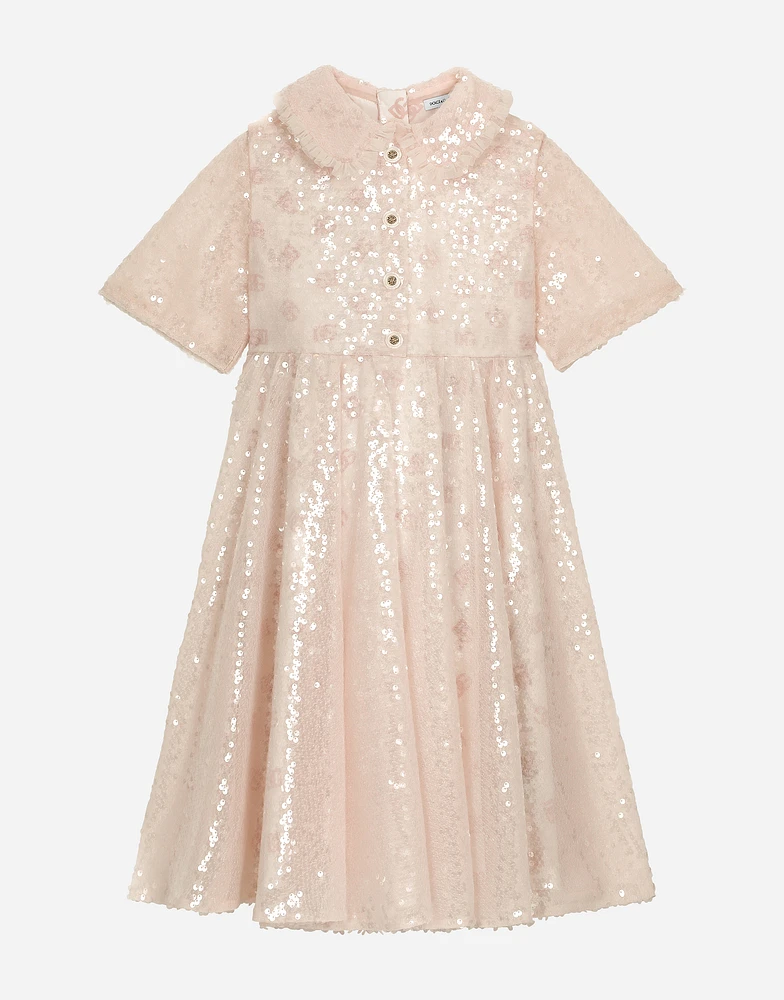 Sequined dress with branded buttons