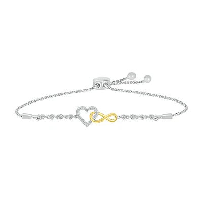 Infinity heart women's bracelet in 2-tone sterling silver with white gold and diamonds.. Color: 2 tone | Doucet Latendresse
