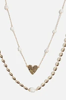 Ensemble de colliers à perles avec pendentif de cœur