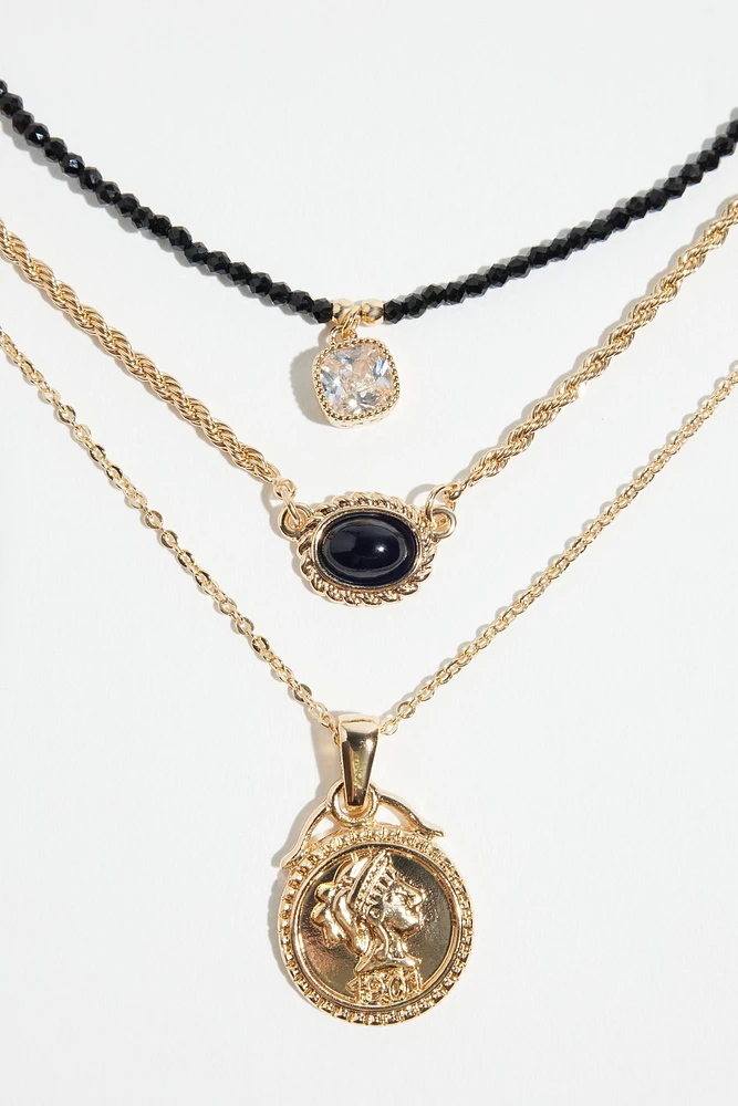 Ensemble de 3 colliers à médaillons et à perles de verre