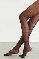 Collants résille diaphanes à pois