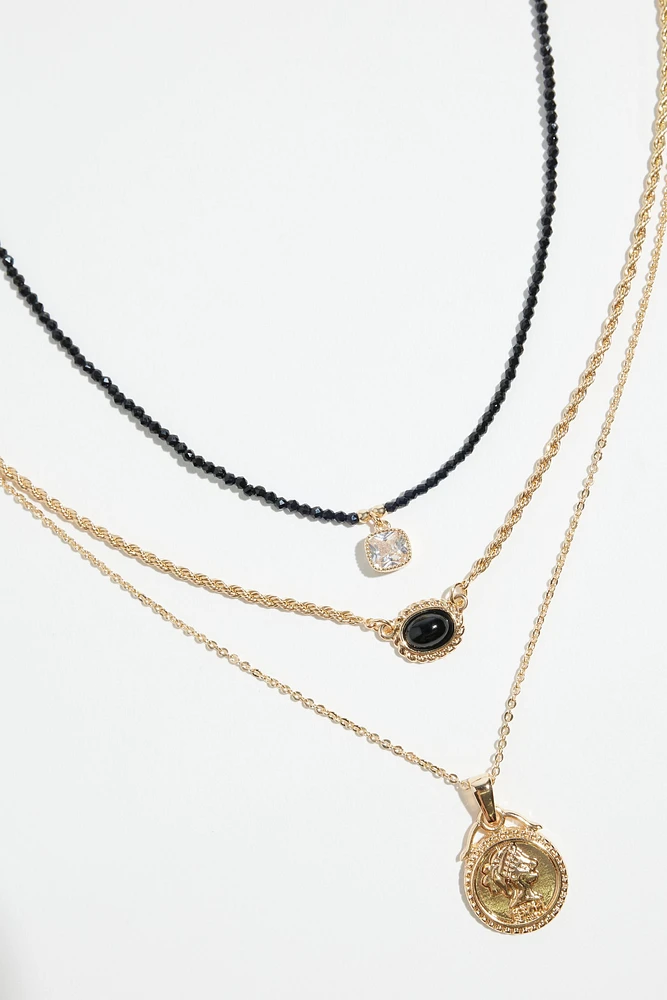 Ensemble de 3 colliers à médaillons et à perles de verre