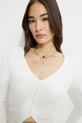 Ensemble de 3 colliers avec perles et à breloques célestes