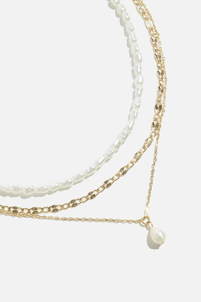 Collier superposé avec perles et chaînes