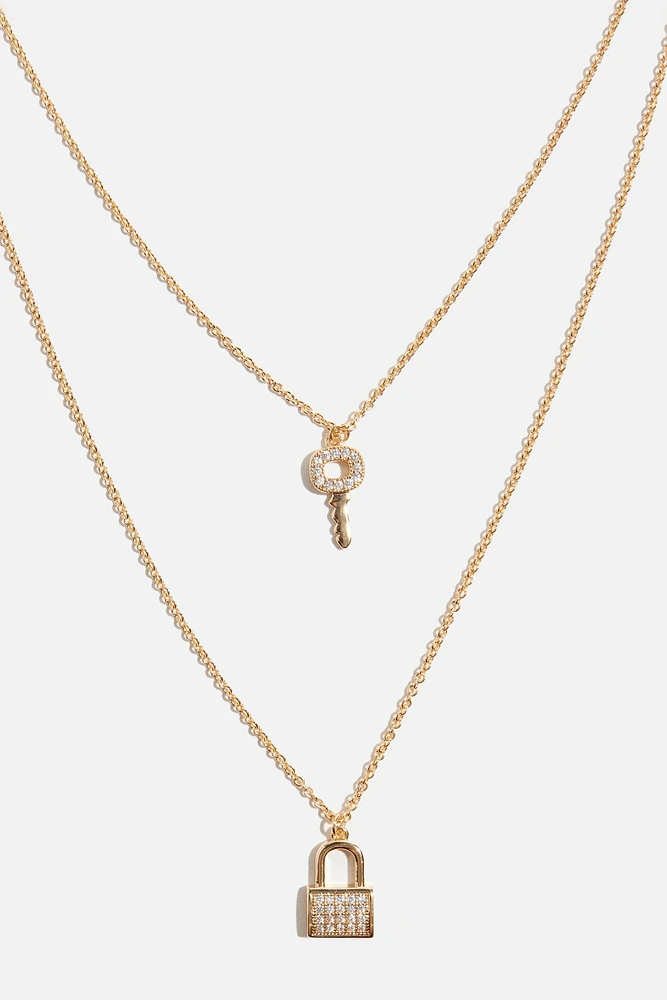 Collier à pavé avec pendentif de serrure et de clé
