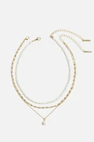 Collier superposé avec perles et chaînes