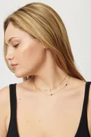 Collier superposé avec disques et pierres