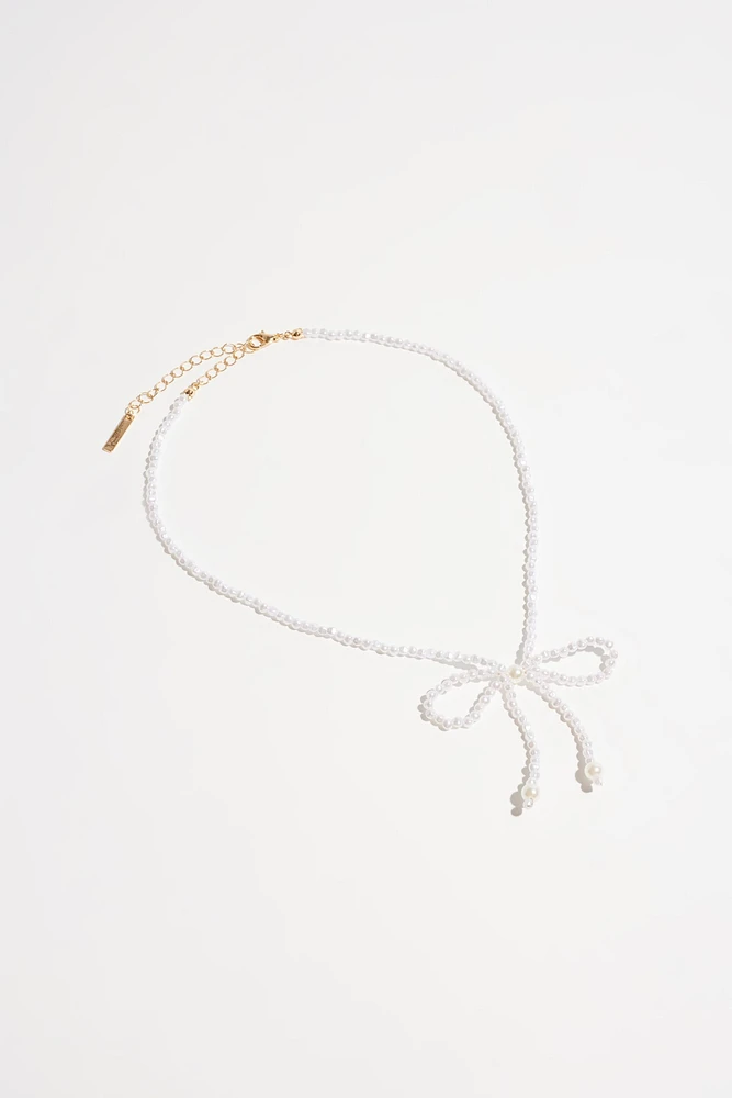 Collier à perles en forme de boucle