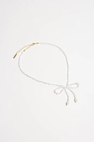 Collier à perles en forme de boucle