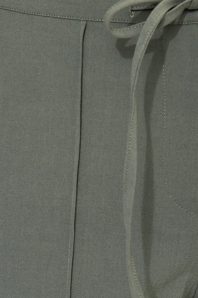 Pantalon à jambe large et cordon nouer
