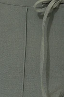 Pantalon à jambe large et cordon nouer