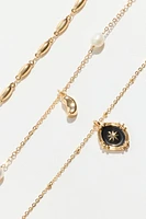 Ensemble de 3 colliers avec perles et à breloques célestes