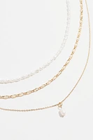 Collier superposé avec perles et chaînes