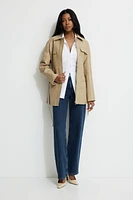 Blouson en faux cuir avec ceinture