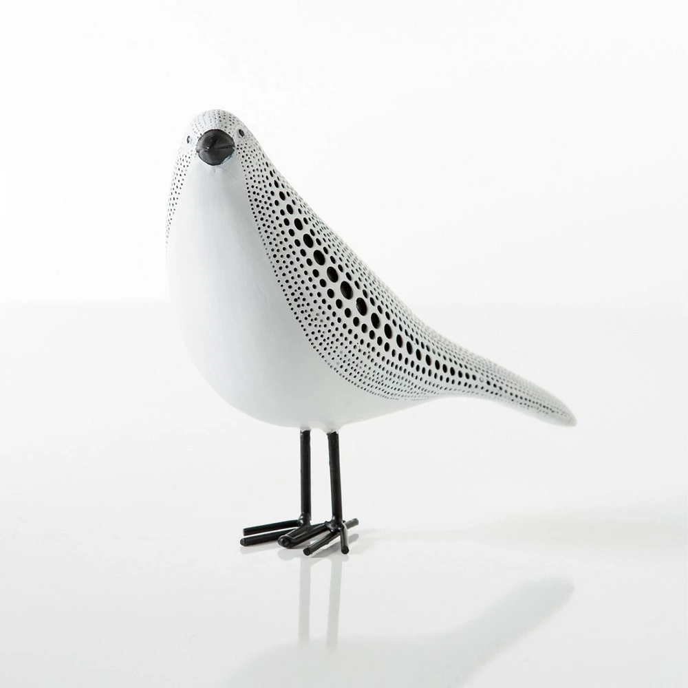 Oiseau debout pointillé en creux