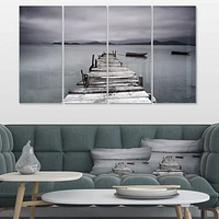 Pier and Boats at Seashore Canvas Wall Art