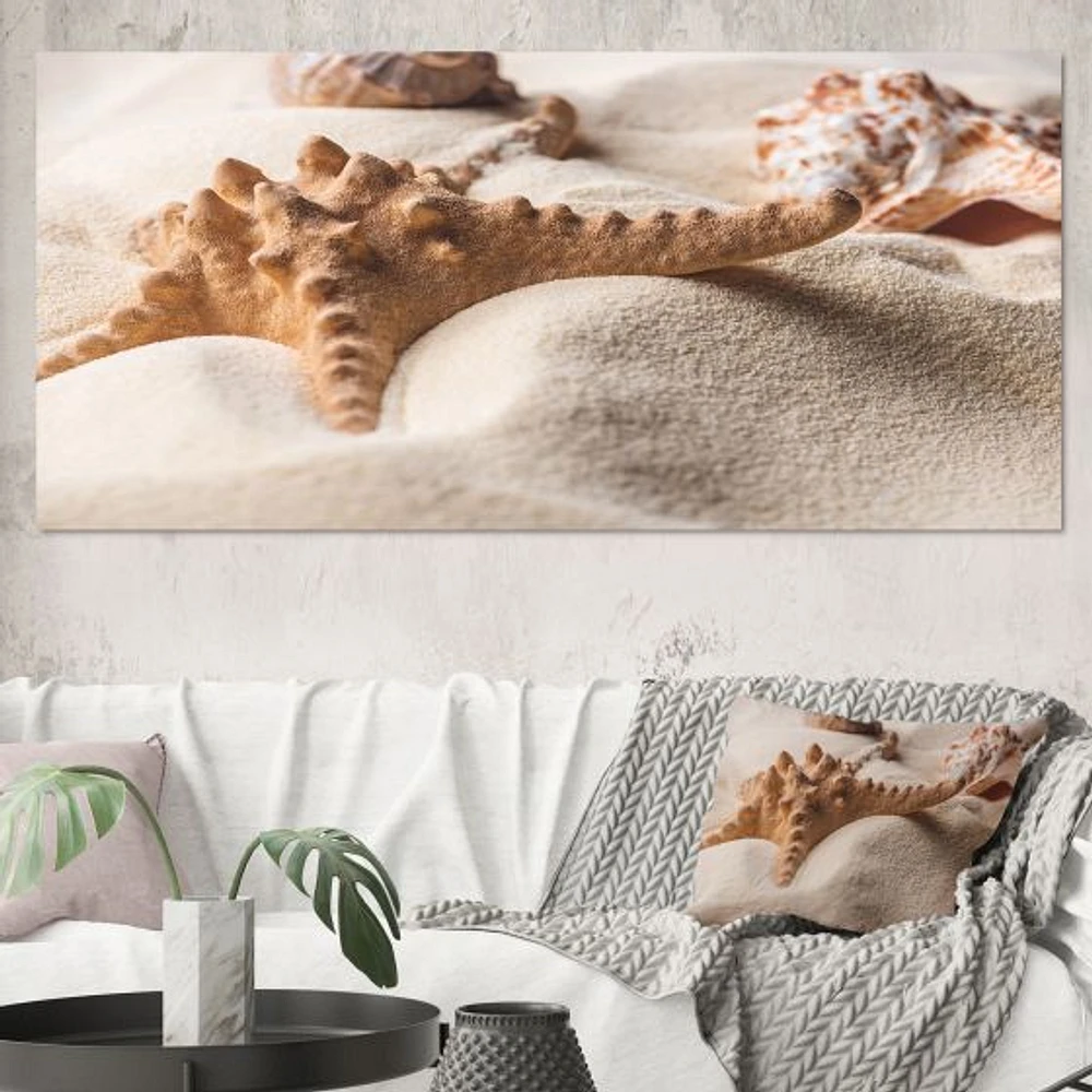 Close Up of Starfish and Seashell on Light Sand Canvas Wall Art Print