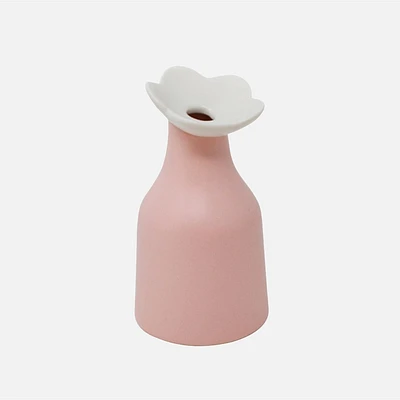 Pink Vase With a White Flower Top