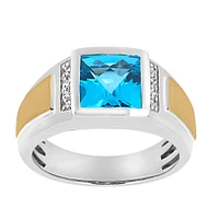 Ring with Blue Topaz and .10 Carat TW of Diamonds in 10kt White and Yellow Gold