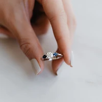 Colourless Collection Engagement Ring with Blue Sapphire and .50 Carat TW of Diamonds in 18kt White Gold