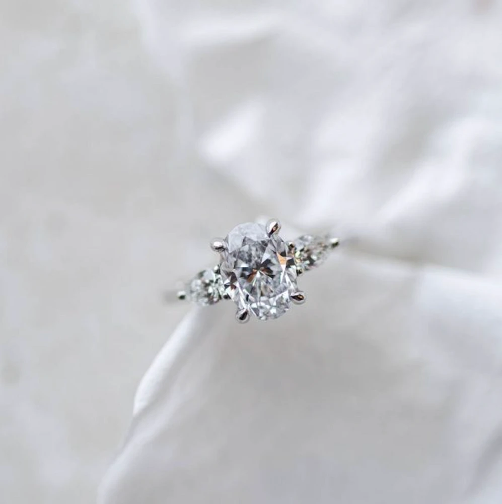 Oval Trilogy Engagement Ring with 2.56 Carat TW of Diamonds in 18kt White Gold