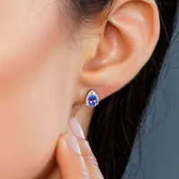 Earrings with .12 Carat TW of Diamonds and Tanzanite in 10kt White Gold