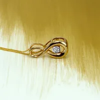 Fire of the North Pendant with .05 Carat Diamond in 10kt Yellow Gold with Chain