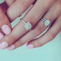 Fire of the North Oval Halo Engagement Ring with .72 Carat TW of Diamonds in 18kt White Gold