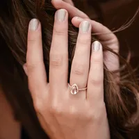 Ring with Morganite and .21 Carat TW of Diamonds in 14kt Rose Gold