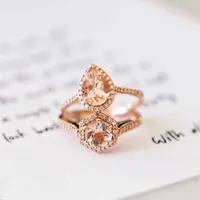Ring with Morganite and .21 Carat TW of Diamonds in 14kt Rose Gold