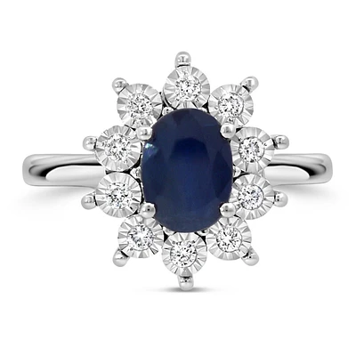 Oval Halo Ring with Blue Sapphire and .18 Carat TW of Diamonds in 10kt White Gold