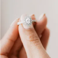 Halo Engagement Ring with 1.25 Carat TW of Diamonds in 14kt White Gold