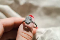 Colourless Collection Oval Halo Engagement Ring with 1.25 Carat TW of Diamonds in 18kt White Gold