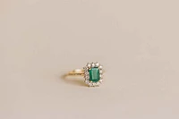 Ring with 7X5MM Emerald Cut Emerald and .45 Carat TW of Diamonds in 14kt Yellow Gold