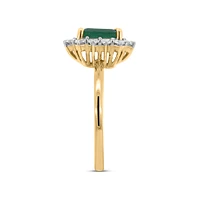 Ring with 7X5MM Emerald Cut Emerald and .45 Carat TW of Diamonds in 14kt Yellow Gold