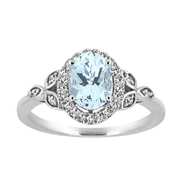 Ring with 6X8 Oval Aquamarine and .20 Carat TW of Diamonds in 10kt White Gold