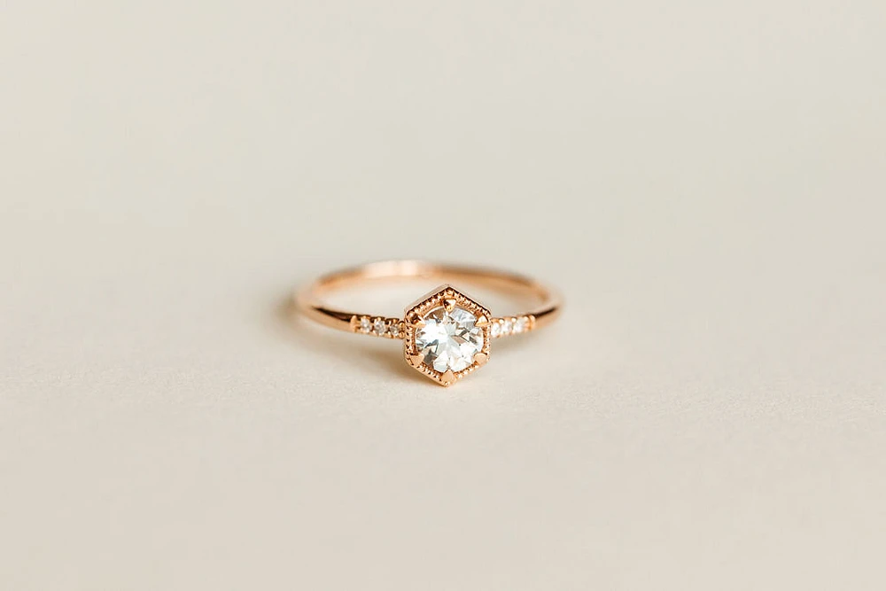 Ring with 5MM Aquamarine and .03 Carat TW of Diamonds in 10kt Rose Gold