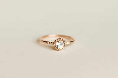Ring with 5MM Aquamarine and .03 Carat TW of Diamonds in 10kt Rose Gold