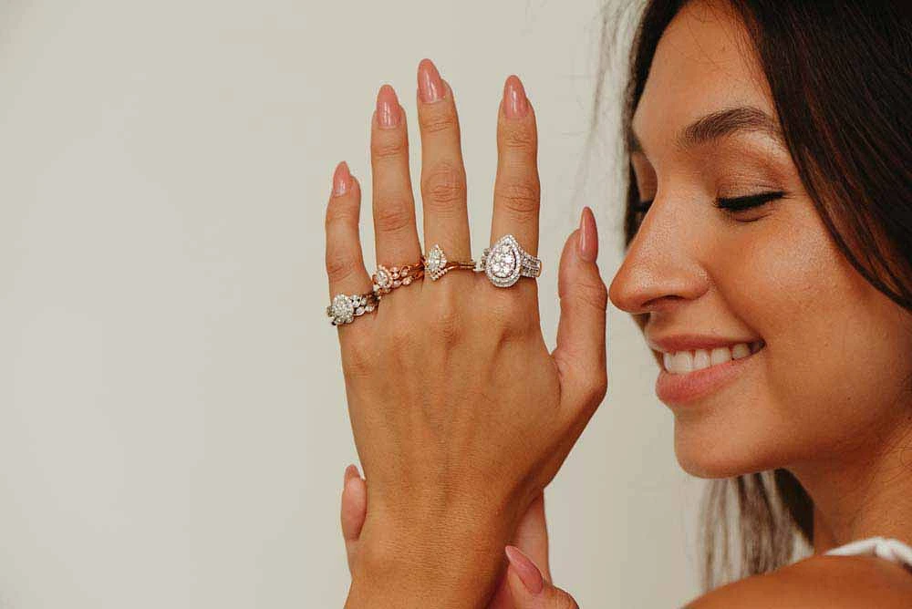 Halo Engagement Ring with .63 Carat TW of Diamonds in 14kt White Gold