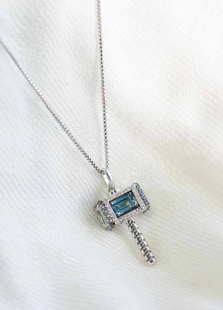 Marvel Thor’s Hammer “Mjolnir”  Pendant with Swiss Blue Topaz and .20 Carat TW of Diamonds in Silver with Chain