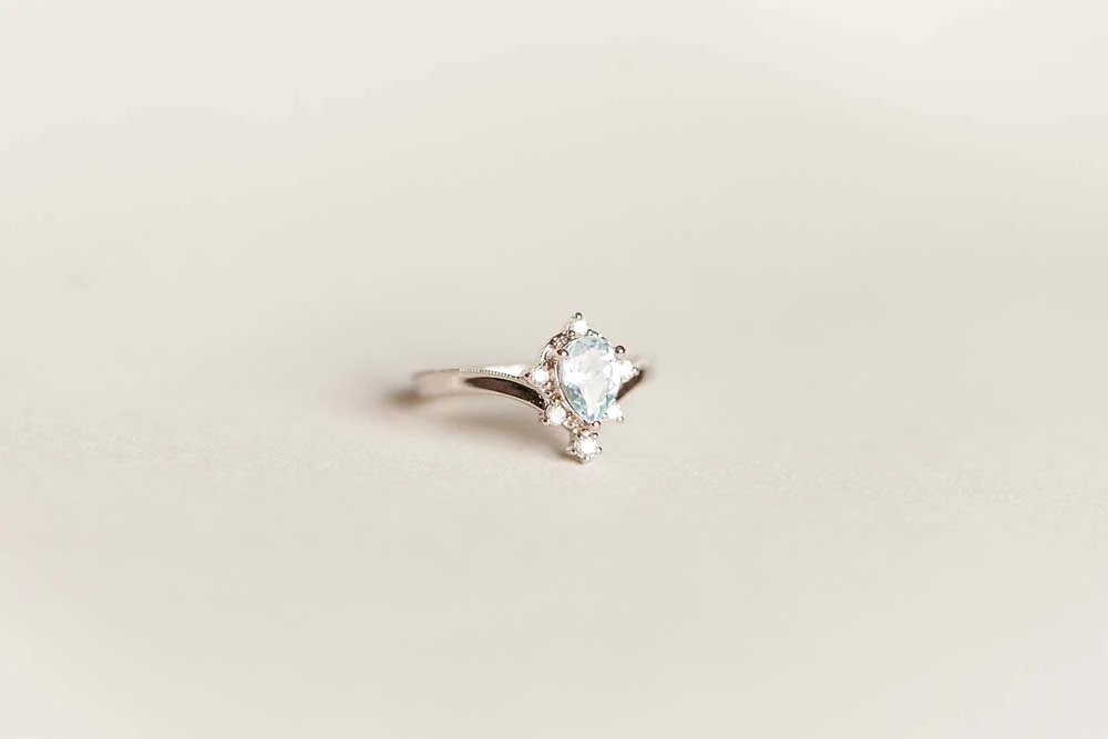 Ring with 7X5MM Aquamarine and .10 Carat TW of Diamonds in 14kt White Gold