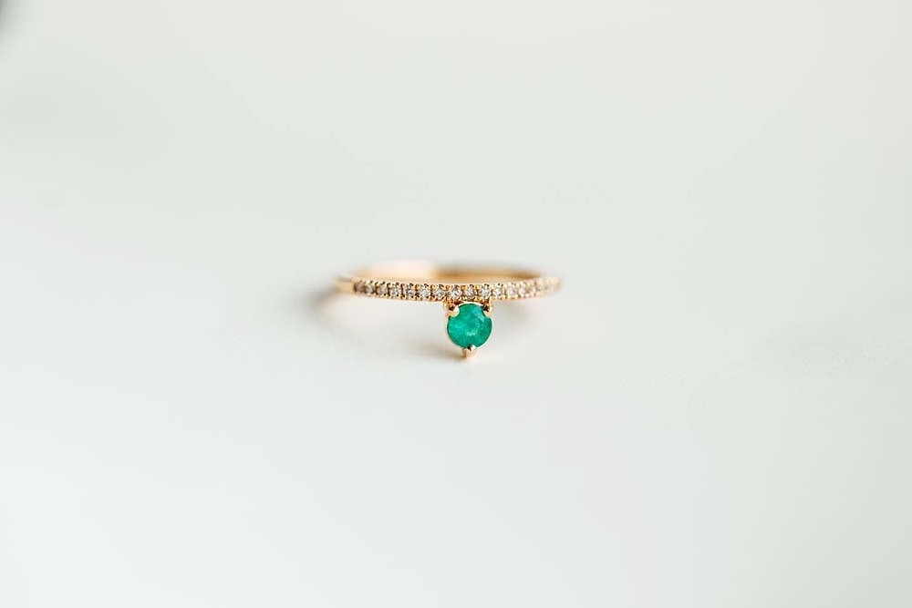Ring with 3.8MM Round Emerald and .12 Carat TW of Diamonds in 14kt Yellow Gold