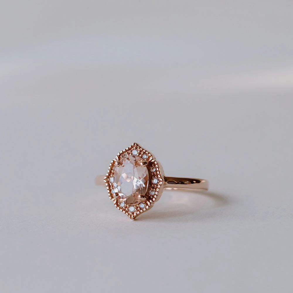 Ring with 8X6MM Oval Morganite and .08 Carat TW of Diamonds in 10kt Rose Gold