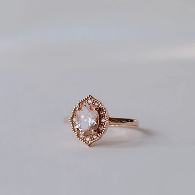 Ring with 8X6MM Oval Morganite and .08 Carat TW of Diamonds in 10kt Rose Gold