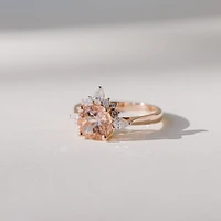 Ring with 7MM Round Morganite and .25 Carat TW of Diamonds in 14kt Rose Gold